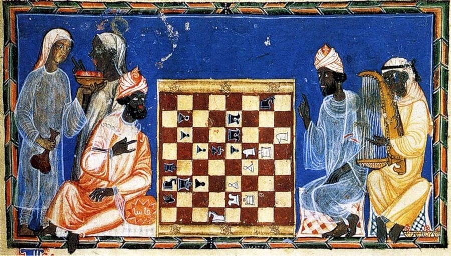 Игра в шахматы. Миниатюра Книги игр, созданной по заказу короля Кастилии и Леона Альфонсо X. 1283 / slide-share.ru Игра в шахматы. Миниатюра Книги игр, созданной по заказу короля Кастилии и Леона Альфонсо X. 1283 / slide-share.ru